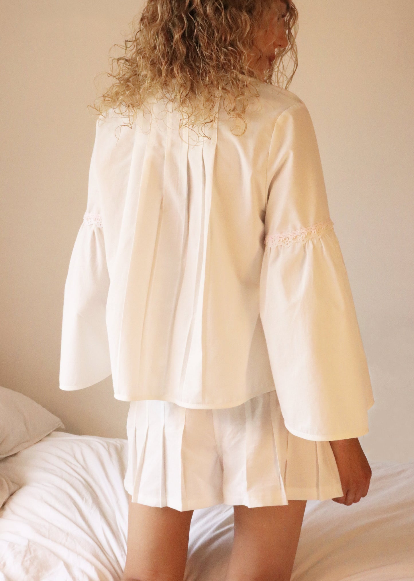 Low-Rise Pleated Cotton Shorts